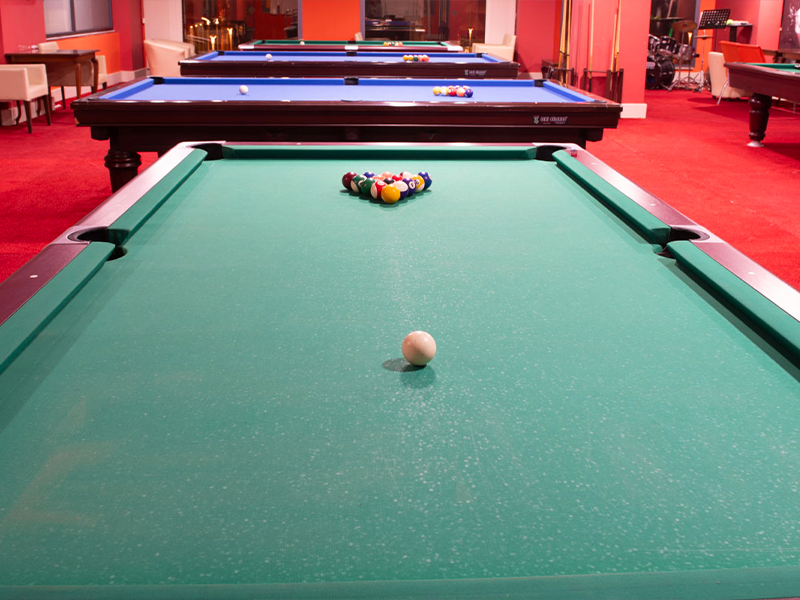 Players enjoying billiards at Green Nature Arcade in Marmaris